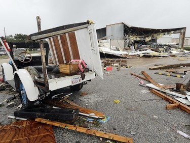 Debris is scattered from Hurricane Harvey Saturday, Aug. 26, 2017, in Katy, Texas.  Harvey rolled over the Texas Gulf Coast on Saturday, smashing homes and businesses and lashing the shore with wind and rain so intense that drivers were forced off the road because they could not see in front of them.  (AP Photo/David J. Phillip) ORG XMIT: TXDP121