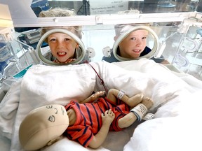 Lucas and Emmett Heynen, 5, are twins who  received four months of neonatal intensive care at Foothills Hospital.