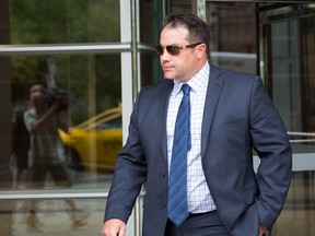 James Othen leaves the Calgary Courts Centre Monday, August 21 2017.