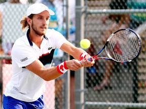 Filip Peliwo competes at the Calgary Tennis Club in downtown Calgary.
