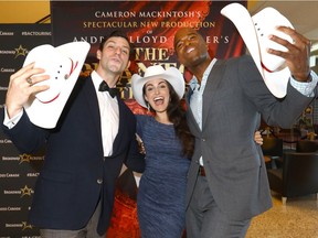 Cast members from The Phantom of the Opera, Jordan Craig, Eva Tavares and Derrick Davis pose with their white hats they received during a White Hat Ceremony at the Southern Alberta Jubilee Auditorium in Calgary on Thursday.