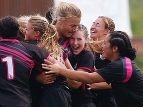 The Wolfpack from Ontario celebrates a victory at the Canadian Rugby Championships on Aug. 20, 2017.