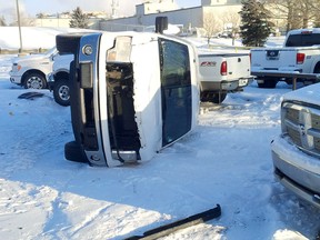 One of the vehicles overturned after a man went on a rampage with a front-end loader on Dec. 25, 2015, in Red Deer.