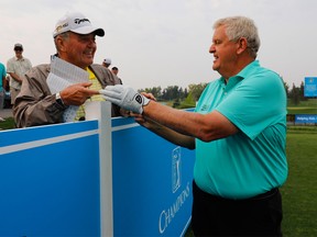 Colin Montgomerie chats with a fan during the Pro-Am at the Shaw Charity Classic in Calgary, Alberta, August 30, 2017.