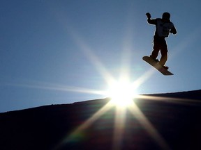 A snowboarder gets some air over a jump at WInsport (Canada Olympic Park) in Calgary, Alta on Sunday January 15, 2017 during the sixth annual World Snow Day. The FIS (International Ski Federation) created World Snow Day six years ago, to give children the chance to explore, enjoy and experience the snow. The premise behind this special day fully aligns with WinSport's purpose – to inspire and activate human potential through the spirit of sport. Jim Wells//Postmedia
Jim Wells, Jim Wells/Postmedia