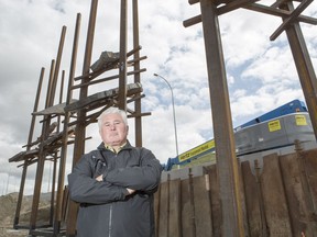 Councillor Ward Sutherland stands in front of a newly installed art piece near the intersection of 16 Avenue and Bowfort Road NW on Friday, August 4, 2017 in Calgary, Alta. The Councillor is a fan of art, but not of this newly installed piece in his jurisdiction of Ward 1. Britton Ledingham/Postmedia Network

Handout Not For Resale
Britton Ledingham, Britton Ledingham/Postmedia Netw