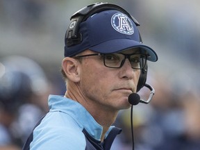 Toronto Argonauts Head Coach Marc Trestman looks on before his team kicks off first half CFL football action against the BC Lions, in Toronto on Friday, June 30, 2017. THE CANADIAN PRESS/Chris Young