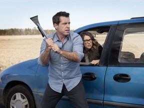 Jason Jones and Natalie Zea are shown in a still image from the comedy "Detour" in this undated handout image.