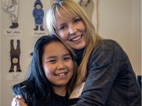 Kelly VanderBeek with a student from Pond Inlet on Baffin Island, one of the places she visited on a recent trip to the Arctic. Credit Roger Pimenta, One Ocean Expeditions
Roger Pimenta