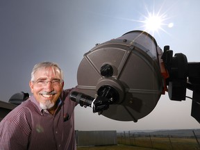 Dr. Phil Langill, director of the Rothney Astrophysical Observatory, will be watching the partial eclipse closely on Monday. At its peak in Calgary, about 80 per cent of the sun's rays will be blocked by the moon.