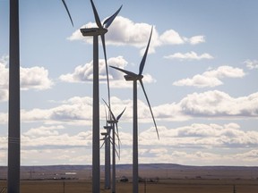 Wind turbines are shown at a wind farm near Pincher Creek