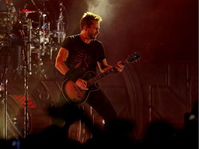 Nickelback performs at the Scotiabank Saddledome in Calgary on Tuesday.