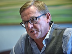 Education Minister David Eggen speaks from his legislature office Wednesday about a bill he plans to introduce in the fall sitting.