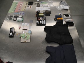 Some of the items confiscated by police during a series of arrests made in an auto theft crackdown over the Labour Day weekend.