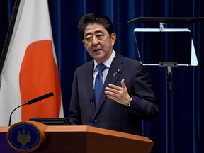 Japan's Prime Minister Shinzo Abe gestures as he speaks during a press conference at his official residence in Tokyo on September 25, 2017. Abe called a snap election, hoping to capitalise on rising support as tensions with nearby North Korea reach fever pitch. / AFP PHOTO / Toru YAMANAKATORU YAMANAKA/AFP/Getty Images