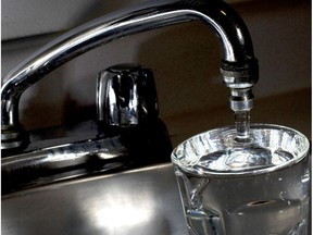 Local Input~ TORONTO, ON: OCTOBER 26, 2009 --  A tap fills a glass with Toronto tap water, Monday afternoon, October 26, 2009. According to a recent study by a University of Michigan scientist, bacteria resistant to some antibiotics have been found in Toronto tap water.  (Aaron Lynett / National Post)  //NATIONAL POST STAFF PHOTO
Aaron Lynett