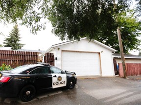 Calgary Police hold the scene after a man was shot by police on Markerville Road N.E on Thursday, September 21, 2017.