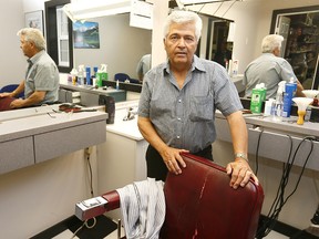 Gary Anctil from Gary's Barber Shop in Pincher Creek is happy with the rain.