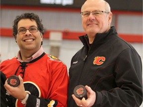 Calgary Flames President and CEO Ken King and Mayor Naheed Nenshi in 2011 at the official opening of the new sheet of ice at the Flames Community Arenas.