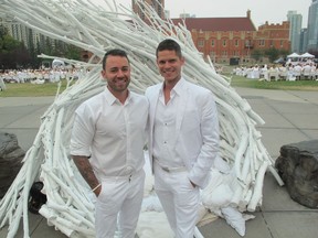 Diner 1:  Pictured with reason to smile at the SRO 5th annual Diner en Blanc, Calgary are hosts with the most Cory Edwards (left) and Tyler Rygus. Nearly 1500 white-clad guests gathered at Shaw Millennium Park for an evening of fabulous food, entertainment and people watching.
Bill Brooks, Bill Brooks