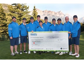The 10th annual Remington Charity Golf Classic was a great success raising a cool $400K for Calgary's Prostate Cancer Centre. Pictured, from left, are tournament directors: Ryan Remington, Justin Mayershak, Cody Clayton, Randy Remington, Darwin Flathers, Carl Cheverie Gary Holbrook, Alex Wong, Randy Magnussen and Dave Rutledge. Photo by Shelley Buchan