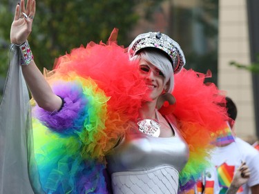 Calgarians take part in the Calgary Pride Parade on Sunday September 3, 2017.