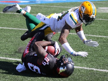 Davaris Daniels catches a 47 yard pass against the Edmonton Eskimos during the second half of the Labour Day Classic at McMahon Stadium, Monday September 4, 2017.