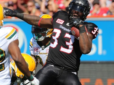Calgary Stampeders running back Jerome Messam runs in a touch down during the second half of the Labour Day Classic at McMahon Stadium, Monday September 4, 2017. The Stamps won 39-18.