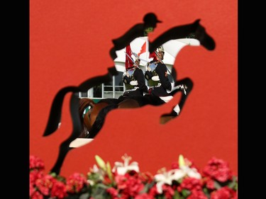 Members of the Household Cavalry are framed in the Canada 150 logo as they practise at Spruce Meadows on Tuesday September 5, 2017. The Spruce Meadows Masters starts Wednesday.