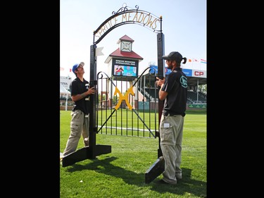 Course workers set up jumps in the International Ring for the Spruce Meadows Masters on Tuesday September 5, 2017. Competition begins Wednesday.