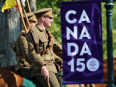 Riders in the Lord Strathcona's Horse Royal Canadians wear World War I style uniforms at Spruce Meadows on Tuesday September 5, 2017. Competition in the Spruce Meadows Masters begins Wednesday.