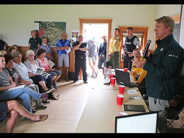 Emergency officials brief a packed community centre in Waterton Alberta on Wednesday September 6, 2017 after a issuing a voluntary evacuation order for the town and surrounding National Park. Residents and visitors in the townsite were warned they could be evacuated with an hours notice if a large fire in B.C. moves closer.
Gavin Young/Postmedia