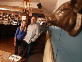 Chelsea and James Hughes in their restaurant Run Pig Run in Calgary's beltline.  Gavin Young/Postmedia