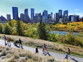 Calgarians use the noon hour to walk and run in the sun on the Calgary Curling Club hill, Tuesday September 26, 2017. Calgary's summer was the hottest since 1961.