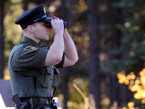 Fish and Wildlife officer Matt Michaud monitors the closed area in Griffith Woods Park.
