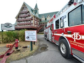Calgary fire trucks stationed outside the historic Prince of Wales hotel in Waterton Lakes National Park in southwest Alberta on Saturday, Sept. 9 2017. As a wildfire approaches the national park, Calgary fire crews have been entrusted with keeping the 90-year-old hotel -- a national historic site -- from harm. Bryan Passifiume/Postmedia Network