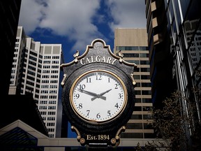 The clock near the Plus-15 walkway over 3rd Street by 6th Avenue S.W. on Tuesday in downtown Calgary.