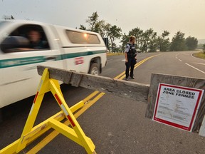 Access to Waterton National Park is blocked off as a wildfire threatens to move east from B.C.