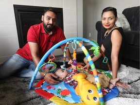 Raj and Kamal Gill and their son Sahib at their new home in Cornerstone by Morrison Homes.