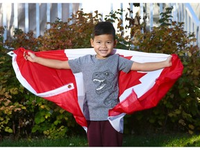 Donnie Dyck is now a Canadian citizen after being adopted in India by Calgarians. He was looking forward to the season's first snowfall, which arrived Monday.