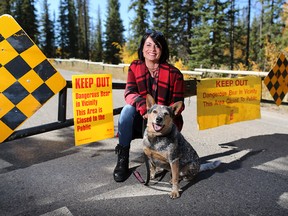 Tresa Gibson and her dog Ellie had a close encounter with a grizzly while running near her home in Discovery Ridge.