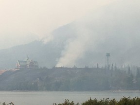 A photo taken by Twitter user Wes Dewsbery @TheDewser shows the Prince of Wales Hotel in Waterton as wildfire threatens the region.