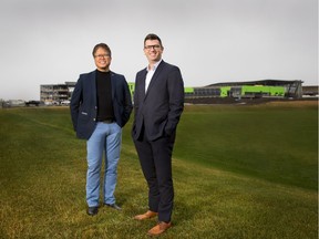 Chito Pabustan and David Wittman, recently appointed partners at Gibbs Gage Architects, stand in front of the Seton Recreation Facility and High School that the firm designed. Supplied photo, Sept. 2017, for David Parker column.
Jason_Dziver-(403)870-2086