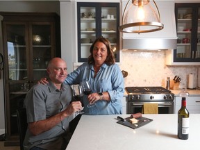 Mark and Alison Heddle love hanging out in the spaciousness of their new home in Shawnee Park.