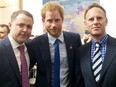 Prince Harry with Andy McCreath, left, and Christian Darbyshire.