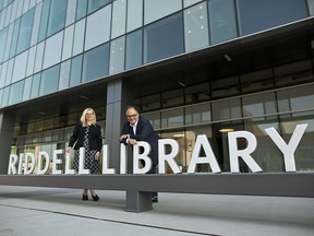 Librarian Carol Shepstone and DIALOG architect John Souleles outside the new Riddell Library and Learning Centre.