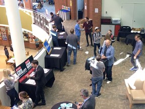 Students and staff at Mount Royal University mingle with candidates from Wards 6, 8 and 11 Thursday afternoon at a meet-and-greet organized by the students association, SAMRU.