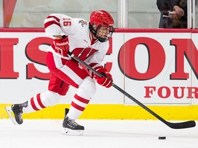 Sarah Nurse playing for the Wisconsin Badgers during an NCAA women's hockey game.