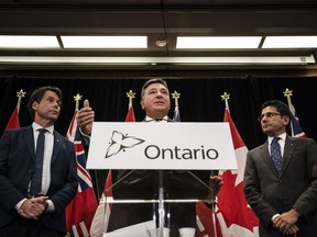 Yasir Naqvi, Charles Sousa,  Eric Hoskins

Minister of Finance, Charles Sousa, centre, Attorney General, Yasir Naqvi, right, and Minister of Health and Long-Term Care, Eric Hoskins speak during a press conference where they detailed Ontario's solution for recreational marijuana sales, in Toronto on Friday, September 8, 2017.