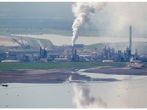 An aerial view of Syncrude's oilsands upgrading facility and Mildred Lake settling basin tailings pond north of Fort McMurray.